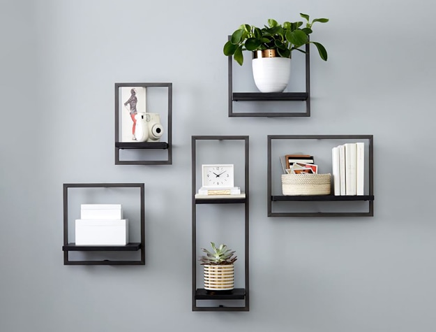 Modular floating shelves with decorative pieces.