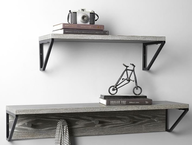 Two rustic wood floating shelves.