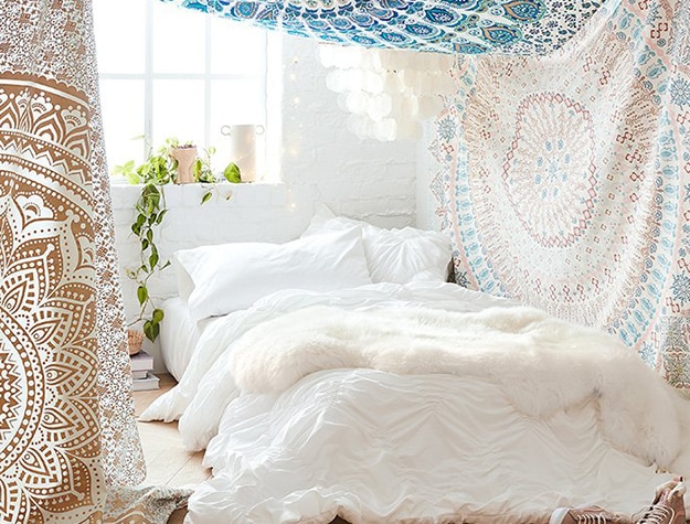 tapestries surrounding bed