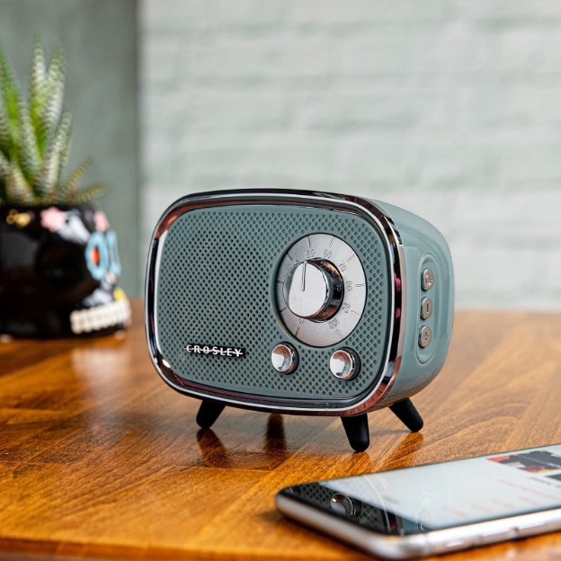 Blue and silver bluetooth speaker. 