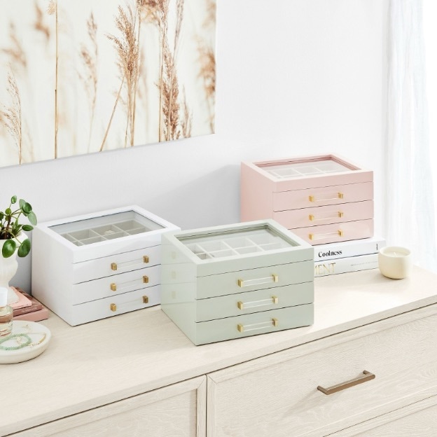 Three jewelry boxes, shown in white, sage green, and blush pink.