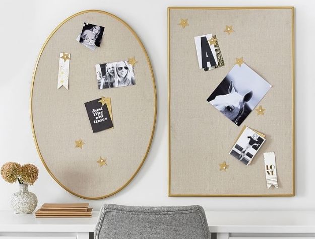 gold framed bulletin board with photos