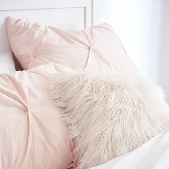 blush fur pillow