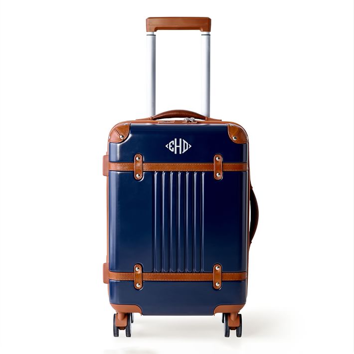 navy and brown luggage