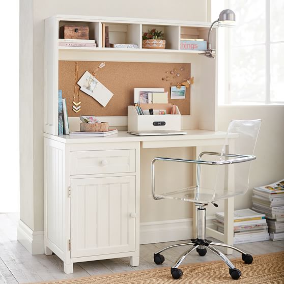 white desk with hutch and cork board