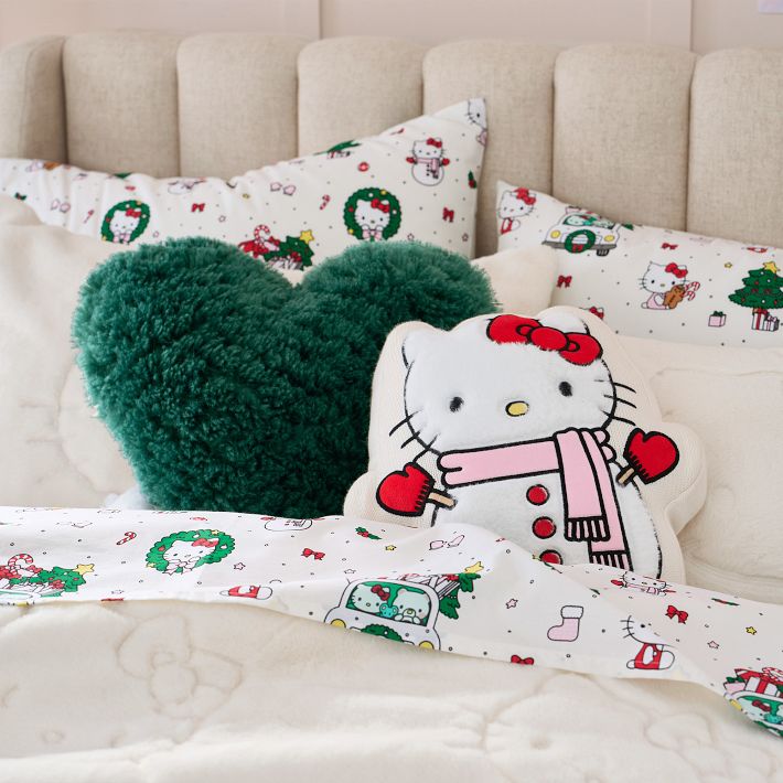 https://assets.ptimgs.com/ptimgs/rk/images/dp/wcm/202333/0107/hello-kitty-snowman-pillow-o.jpg