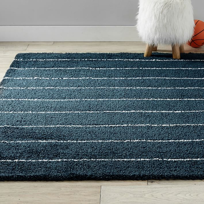 https://assets.ptimgs.com/ptimgs/rk/images/dp/wcm/202339/0021/performance-stripe-shag-rug-1-o.jpg