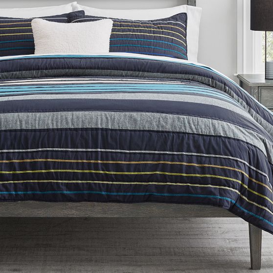 https://assets.ptimgs.com/ptimgs/rk/images/dp/wcm/202344/0015/laid-back-stripes-quilt-1-c.jpg