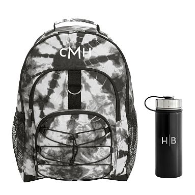 https://assets.ptimgs.com/ptimgs/rk/images/dp/wcm/202348/0212/santa-cruz-tie-dye-black-and-white-backpack-and-solid-blac-m.jpg
