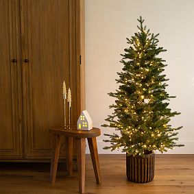 Pre-Lit Christmas Tree in Decorative Planter (4.5 Ft.)