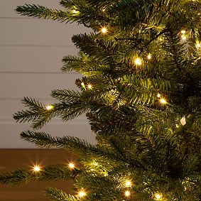 Pre-Lit Christmas Tree in Decorative Planter (4.5 Ft.)