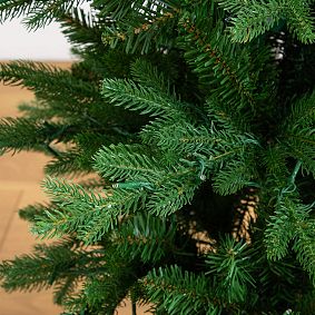 Pre-Lit Christmas Tree in Decorative Planter (4.5 Ft.)